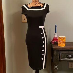 Nice-forever black form fitting dress, size medium.